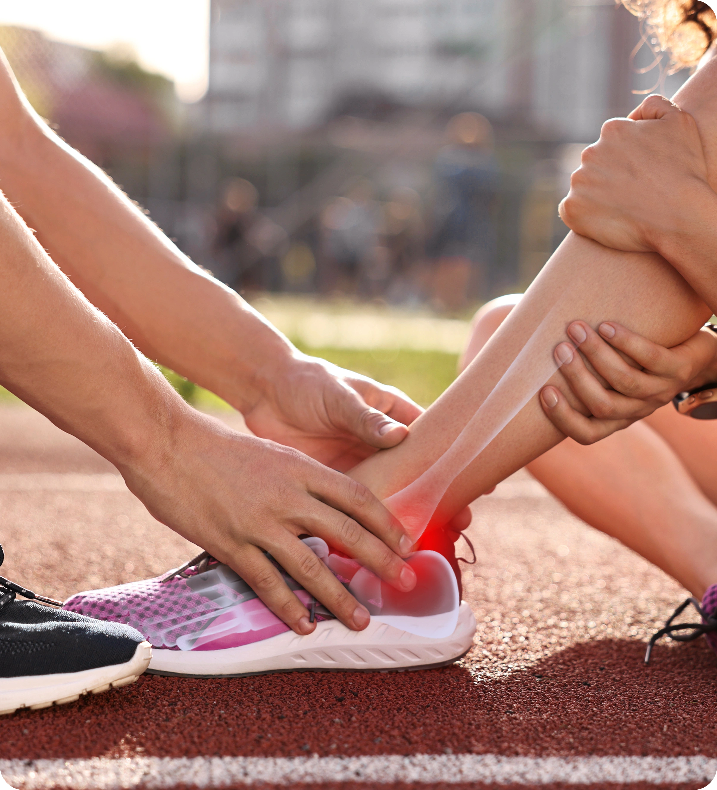 Runner holding an injured ankle